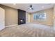 Spacious bedroom with carpeted floor, large window, and ceiling fan at 1670 Simms St, Lakewood, CO 80215