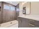 Elegant bathroom with a walk-in shower and modern vanity at 1670 Simms St, Lakewood, CO 80215