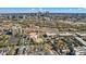Wide aerial view of the city skyline and surrounding neighborhoods at 2736 W 24Th Ave, Denver, CO 80211