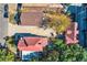 Aerial view of three houses with red roofs and surrounding landscaping at 2736 W 24Th Ave, Denver, CO 80211