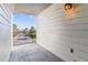 Balcony with white siding and view of neighborhood street at 1648 S Cole St # B7, Lakewood, CO 80228
