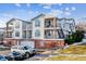 Exterior view of a light-colored condo building with balconies at 1648 S Cole St # B7, Lakewood, CO 80228