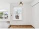 Kitchen features a large window with natural light and tile flooring at 1648 S Cole St # B7, Lakewood, CO 80228