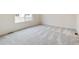 Spacious bedroom with neutral carpet and lots of natural light at 9310 Bahama Ct, Commerce City, CO 80022