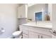 Bathroom features white vanity, toilet, and shower at 2815 W 25Th Ave # 2, Denver, CO 80211