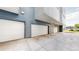 Attached garage with two white doors at 2815 W 25Th Ave # 2, Denver, CO 80211