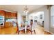 Kitchen nook with a glass-top table and chairs, offering a casual dining space at 5954 Star View Dr, Broomfield, CO 80020