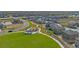 Aerial view of a neighborhood park with playground and homes at 13610 Topaz Pl, Mead, CO 80504