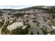 Aerial view showing property, surrounding mountains, and nearby town at 131 Russel Gulch Rd, Central City, CO 80403