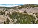Aerial view of mountain cabins nestled in a forest at 131 Russel Gulch Rd, Central City, CO 80403