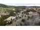 Aerial view of property and surrounding area with mountain views at 131 Russel Gulch Rd, Central City, CO 80403