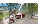 Rustic cabin with hot tub and surrounding trees at 131 Russel Gulch Rd, Central City, CO 80403