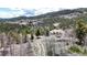 Aerial view of a mountain road winding through a forest at 131 Russel Gulch Rd, Central City, CO 80403