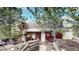 Rustic cabin with hot tub and surrounding trees at 131 Russel Gulch Rd, Central City, CO 80403