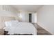 Spacious bedroom with wood-look floors and neutral decor at 920 S Walden Way Way # 103, Aurora, CO 80017