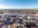 High-rise residential building and surrounding neighborhood, including a large shopping center at 100 Detroit St # 406, Denver, CO 80206