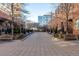 Residential courtyard with benches and landscaping at 100 Detroit St # 406, Denver, CO 80206