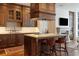 Island kitchen with custom cabinetry, granite countertops and high-end appliances at 100 Detroit St # 406, Denver, CO 80206