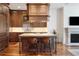 Gourmet kitchen with custom cabinetry, granite counters, and island at 100 Detroit St # 406, Denver, CO 80206