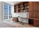 Home office with built-in bookcases and granite desk at 100 Detroit St # 406, Denver, CO 80206