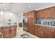 Well-equipped kitchen featuring ample cabinetry and stainless steel appliances at 2851 Gray St, Wheat Ridge, CO 80214