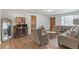 Living room featuring hardwood floors and ample natural light at 2851 Gray St, Wheat Ridge, CO 80214