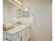 Bright bathroom with a vanity and double sinks at 652 Mountain Chickadee Rd, Highlands Ranch, CO 80126