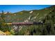 Scenic view of a historic train on a mountain railway at 2121 Hummingbird Way # 103, Georgetown, CO 80444