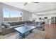 Open concept living room and kitchen with hardwood floors at 7478 Oasis Dr, Castle Rock, CO 80108