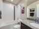 Clean bathroom with bathtub, shower, and granite vanity at 1854 Jules Ln, Louisville, CO 80027