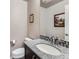 Clean bathroom with granite vanity, updated fixtures, and mosaic tile accents at 1854 Jules Ln, Louisville, CO 80027