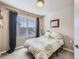 Charming bedroom with window, and neutral decor at 1854 Jules Ln, Louisville, CO 80027