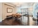 Open dining area with hardwood floors, a large table, and overhead lighting at 1854 Jules Ln, Louisville, CO 80027