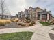 Townhouses with stone accents and landscaping at 1854 Jules Ln, Louisville, CO 80027