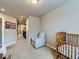 Upper hallway with access to bedrooms and full bath at 1854 Jules Ln, Louisville, CO 80027