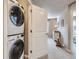 Stackable washer and dryer in a laundry closet at 1854 Jules Ln, Louisville, CO 80027