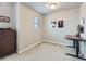 Bright home office features a standing desk and ample natural light at 1854 Jules Ln, Louisville, CO 80027