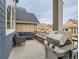 Patio with seating area and gas grill at 1854 Jules Ln, Louisville, CO 80027