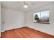 Bright bedroom with wood flooring and a ceiling fan at 3325 Gold Ct, Broomfield, CO 80020