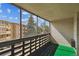 Private balcony with screen enclosure and view at 495 S Dayton St # 10C, Denver, CO 80247