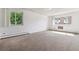 Bright bedroom with carpet flooring and neutral walls at 495 S Dayton St # 10C, Denver, CO 80247