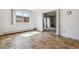 Dining area with tile floor and view into living room at 495 S Dayton St # 10C, Denver, CO 80247