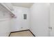 Large closet with double hanging rods and neutral walls at 495 S Dayton St # 10C, Denver, CO 80247