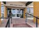 Main entrance to building with steps and railings at 495 S Dayton St # 10C, Denver, CO 80247