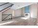 Living room with hardwood floors, fireplace, and high ceiling at 3941 S Carson St # C, Aurora, CO 80014