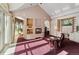 Relaxing living room with a fireplace and access to a sunroom at 1682 Montane E Dr, Golden, CO 80401