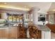 Gourmet kitchen with granite countertops and breakfast bar at 1682 Montane E Dr, Golden, CO 80401