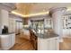 Gourmet kitchen with granite island and custom cabinetry at 1682 Montane E Dr, Golden, CO 80401