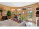 Bright bedroom with access to a private deck and views at 1682 Montane E Dr, Golden, CO 80401