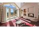 Spacious main bedroom with fireplace and access to balcony at 1682 Montane E Dr, Golden, CO 80401